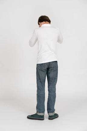 Young man in casual clothes standing