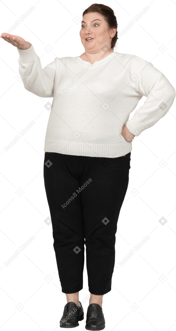 Front view of a happy plump woman in casual clothes gesturing