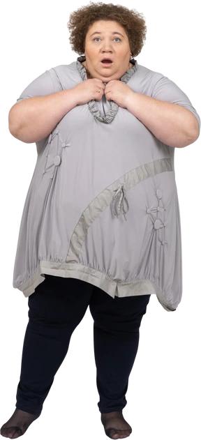 Woman with hands on her chest