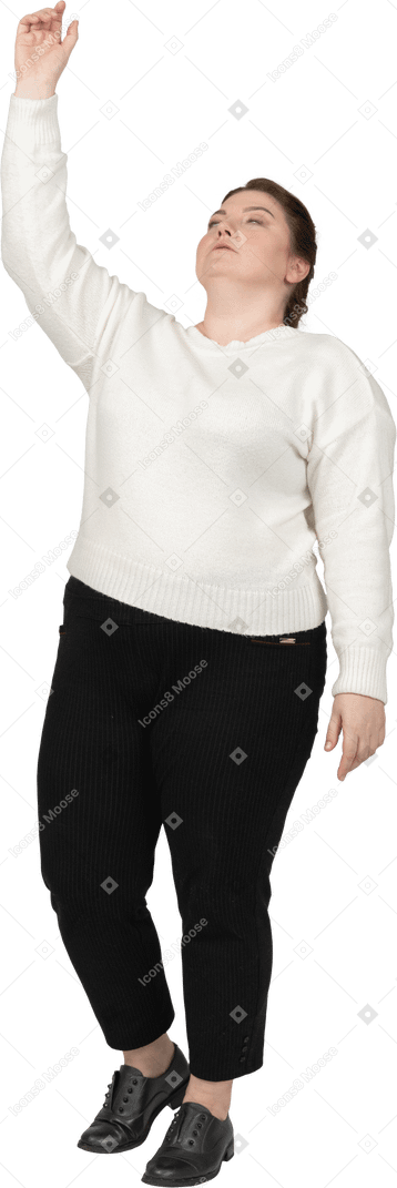 Front view of a plump woman in casual clothes gesturing