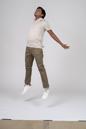 Man in casual clothes jumping