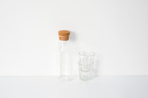 Empty bottle with two glasses