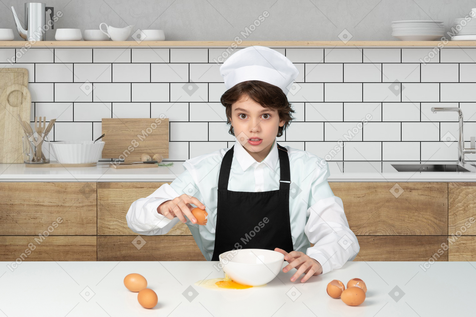 Portrait of a young man cooking in the kitchen