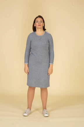 Front view of a woman in grey dress
