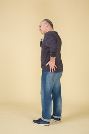 Man in casual clothes posing