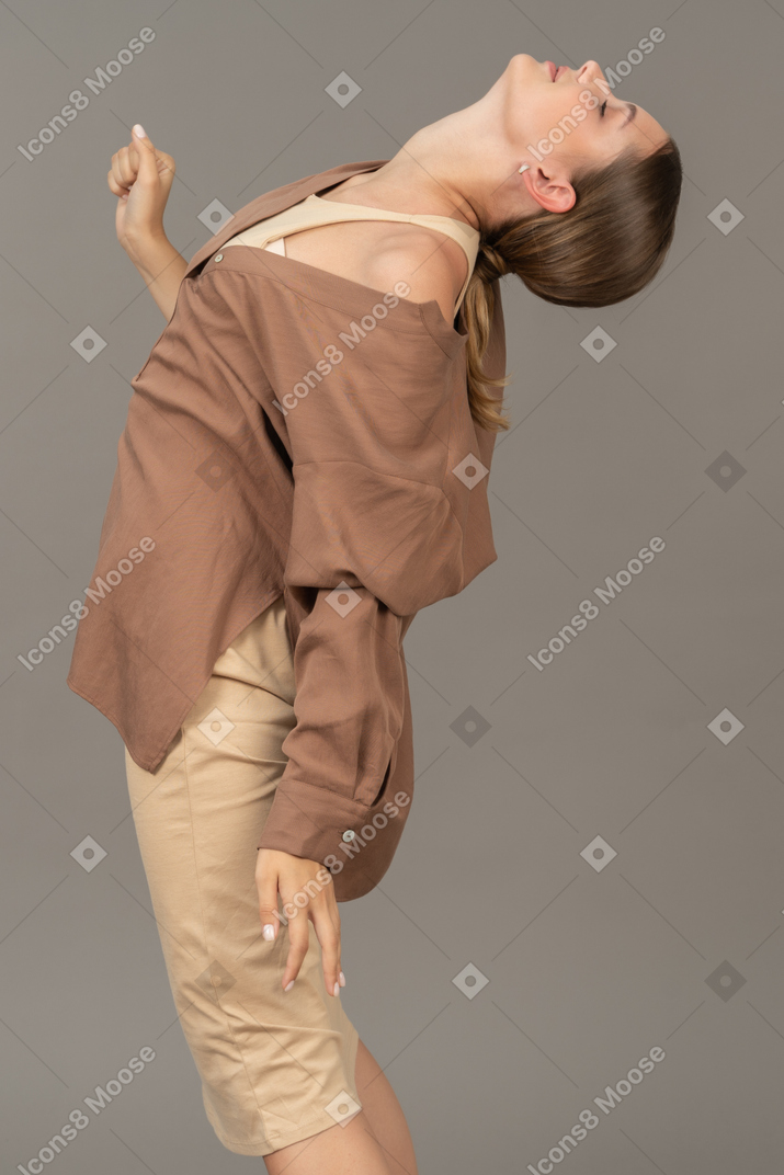 Young woman leaning backwards