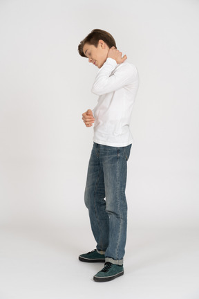 Young man in casual clothes standing