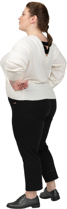 Confident plus size woman in casual clothes standing