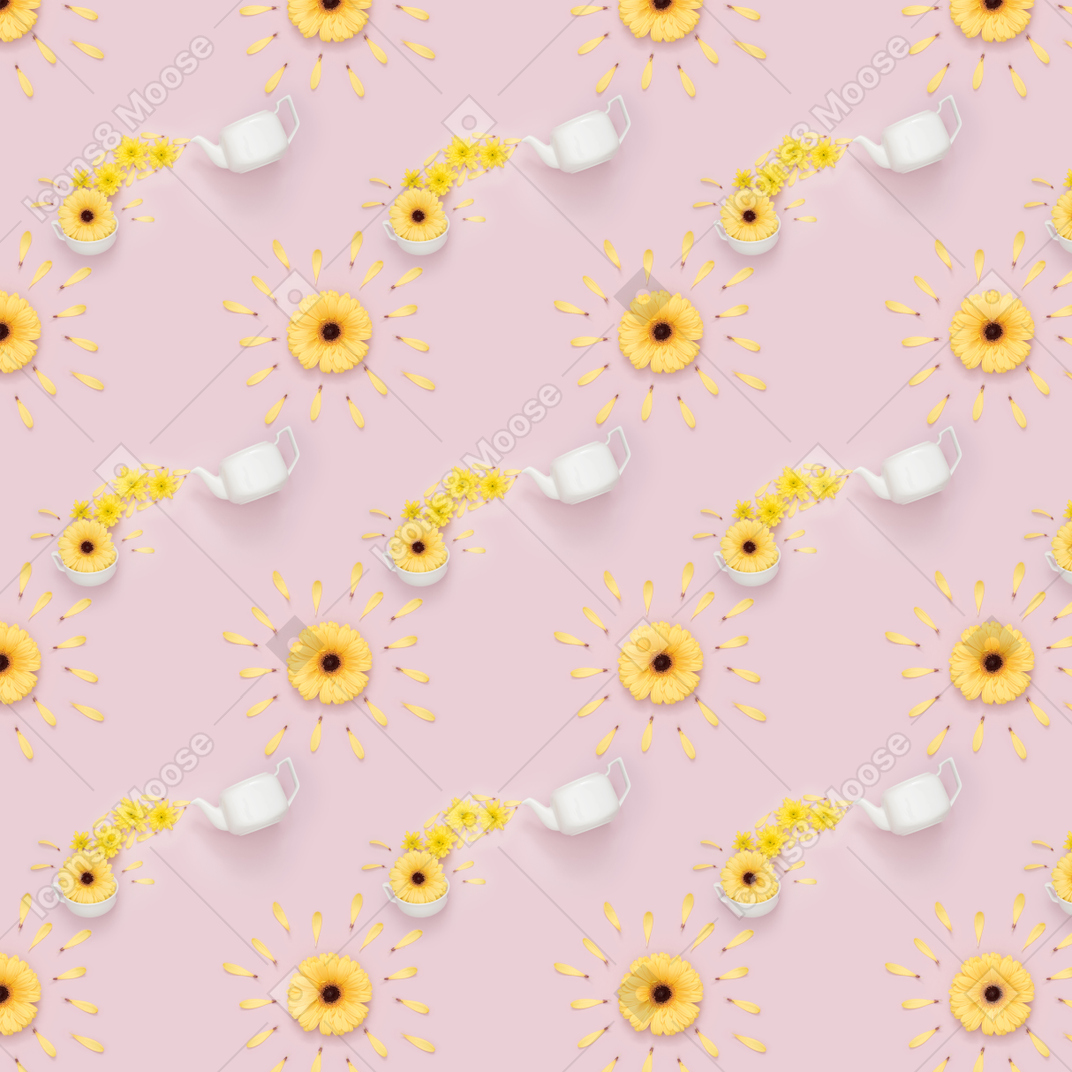 Bule, copo e flores amarelas sobre fundo rosa