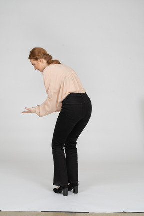 Woman in beautiful blouse standing