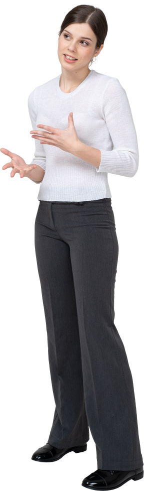 Front view of a woman in white shirt gesturing