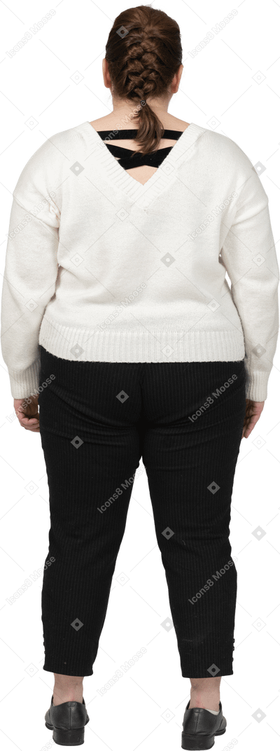 Plump woman in casual clothes standing