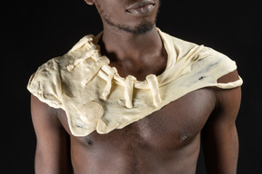 Close-up a male torso with a dough collar