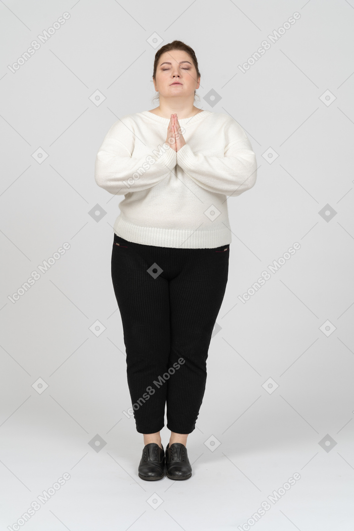 Front view of a plump woman in casual clothes