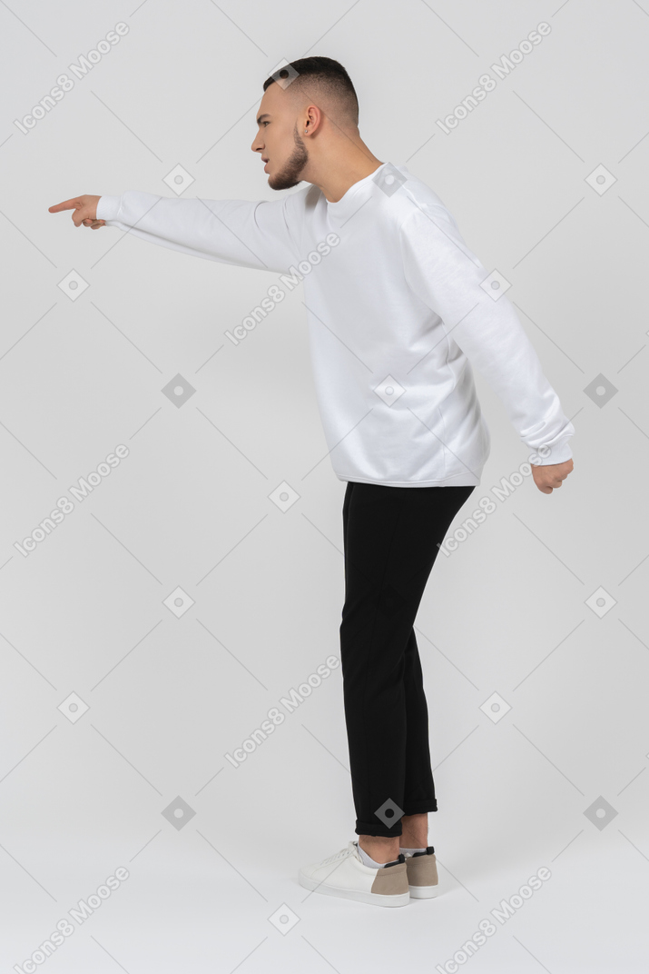 Man in casual clothes arguing