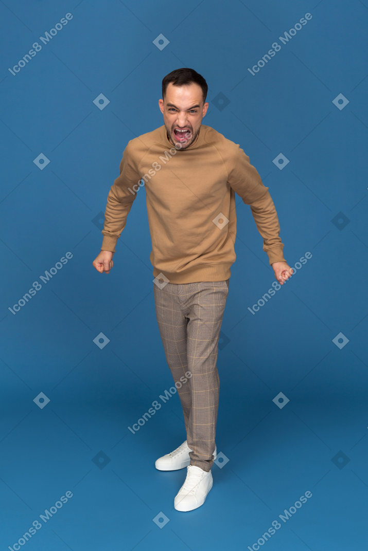 Angry young man shouting