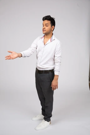 Man in white shirt standing