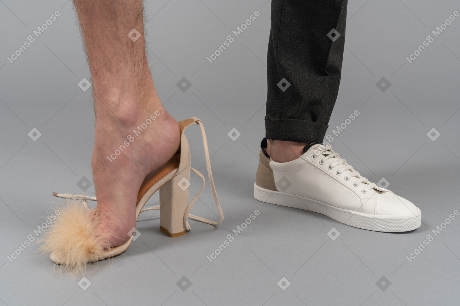 Man wearing heels and sneakers in the same time