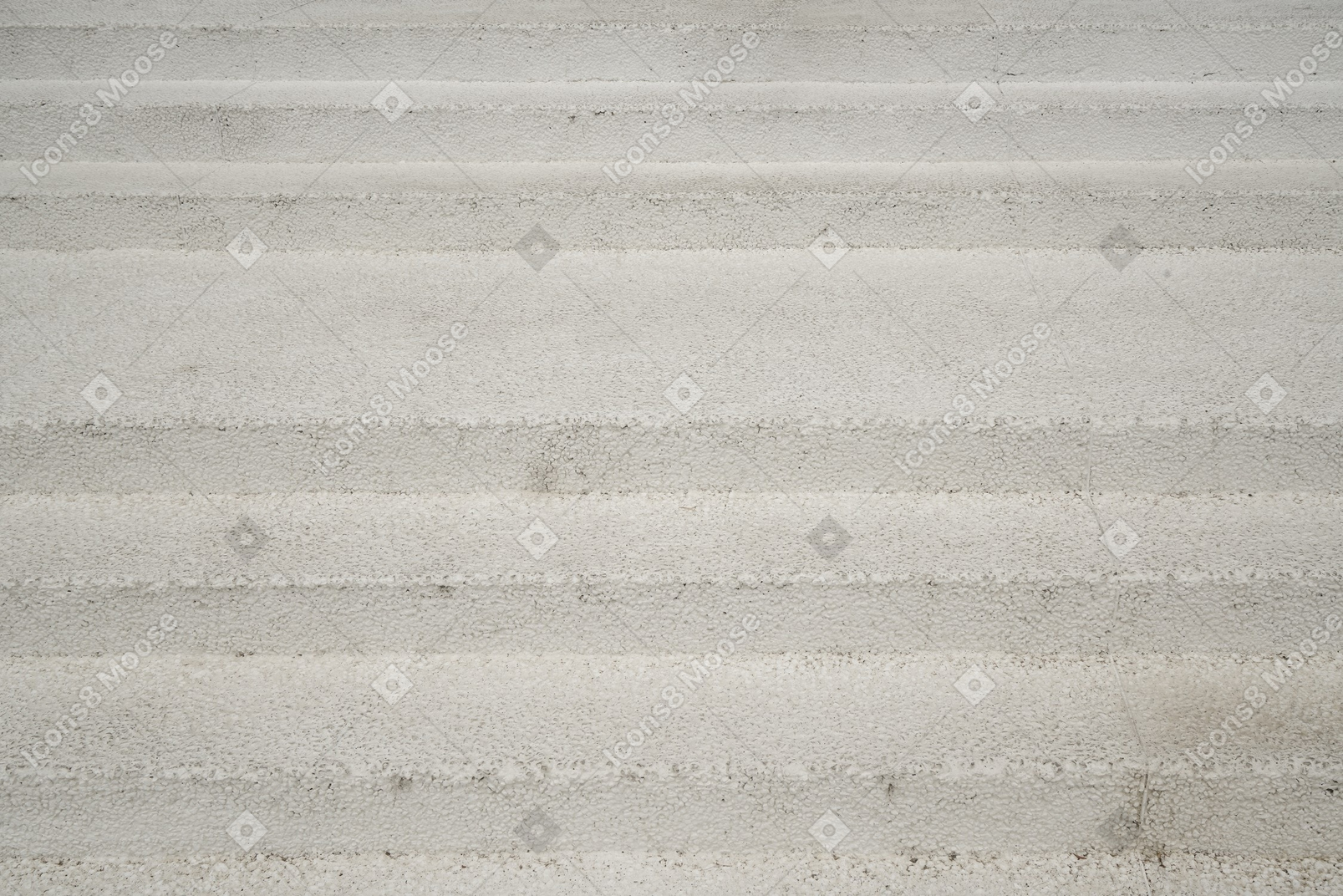 Seamless pattern of white marble elements on a white background