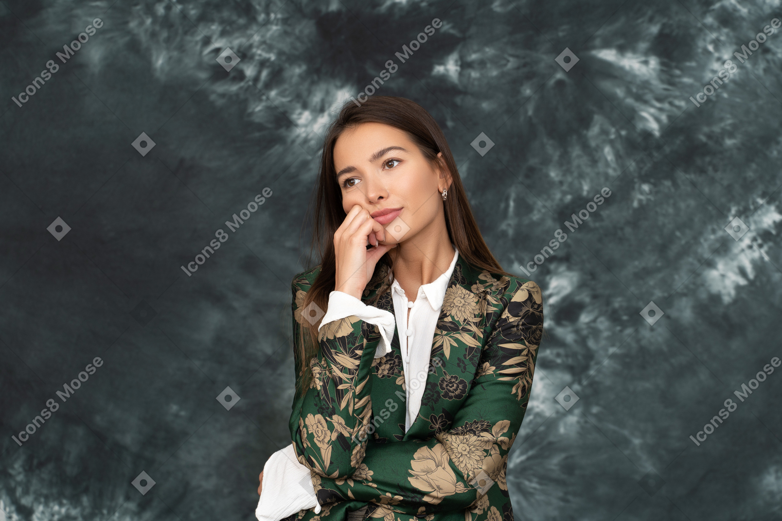 Portrait of businesswoman dreaming and touching her face