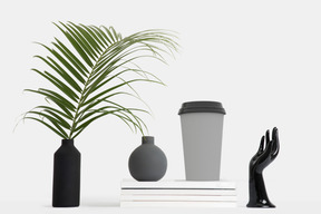 Black vase with palm branch