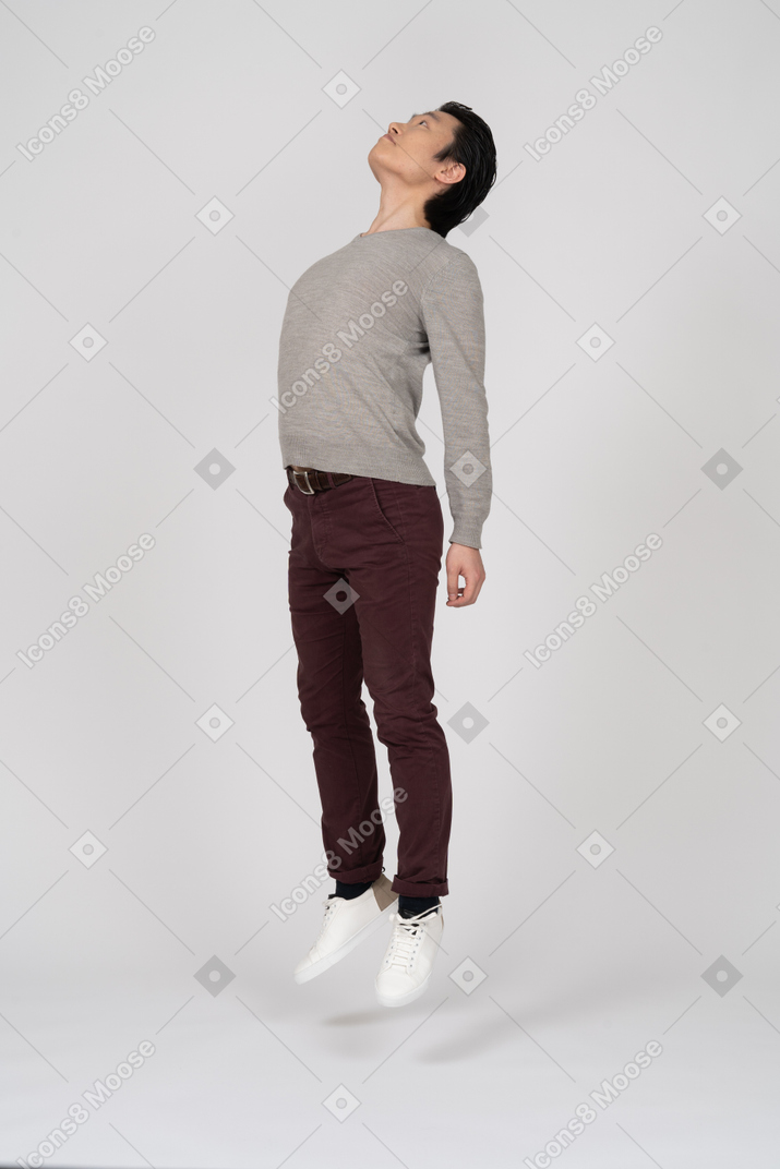 Man in casual clothes jumpung