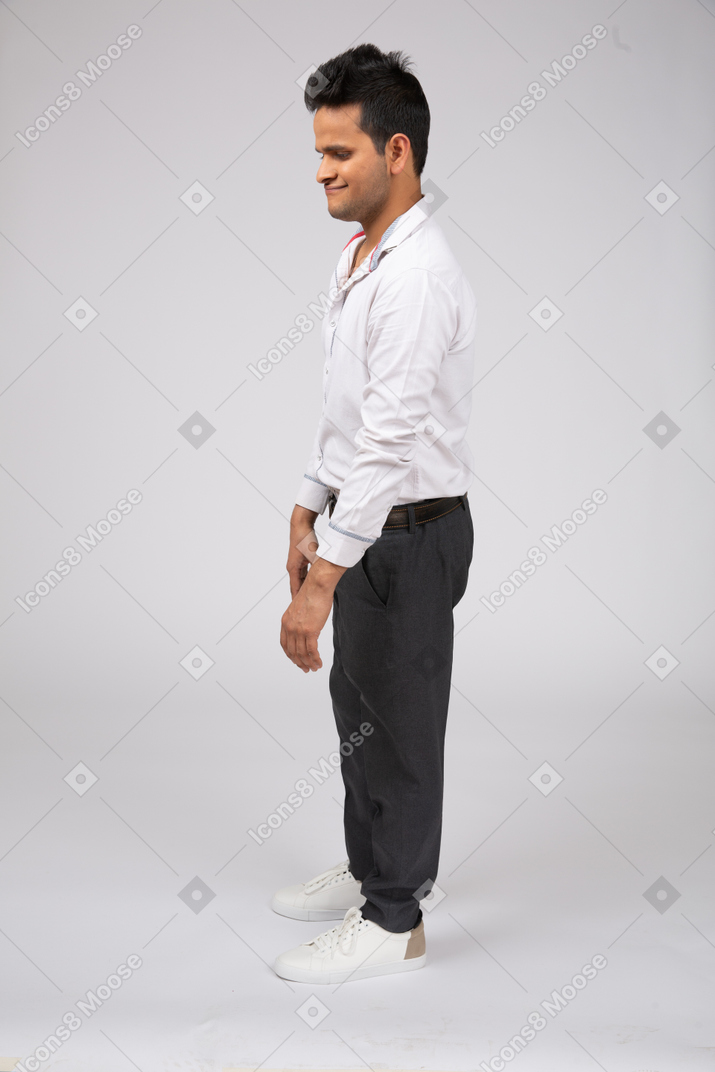 Man in white shirt standing