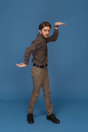 Slim young man showing egyptian poses