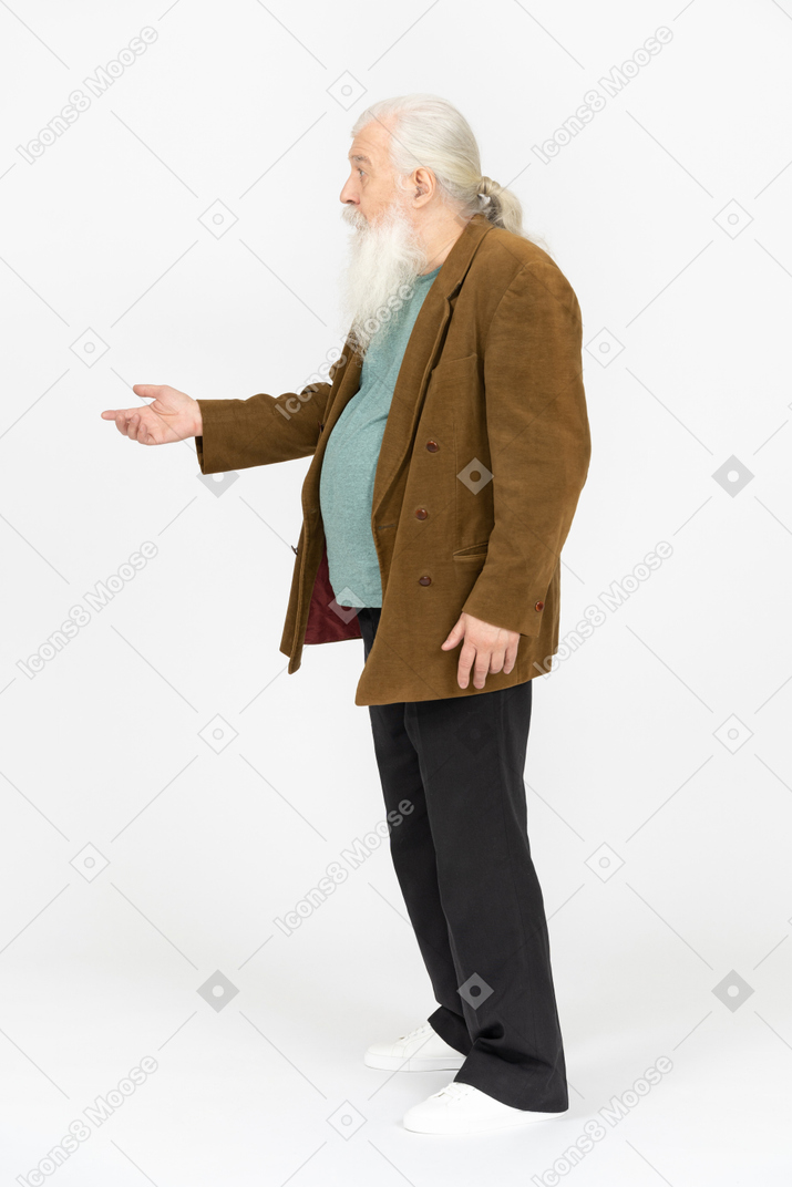 Elderly man reaching his hand out