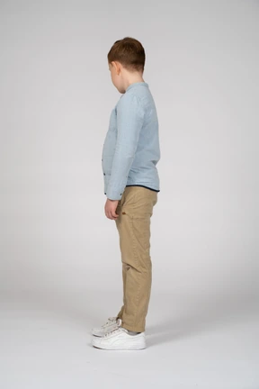 Side view of a cute boy looking down