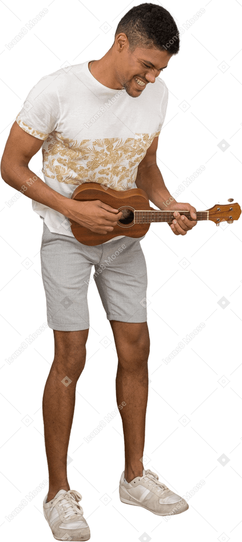 Three-quarter view of a man playing ukulele