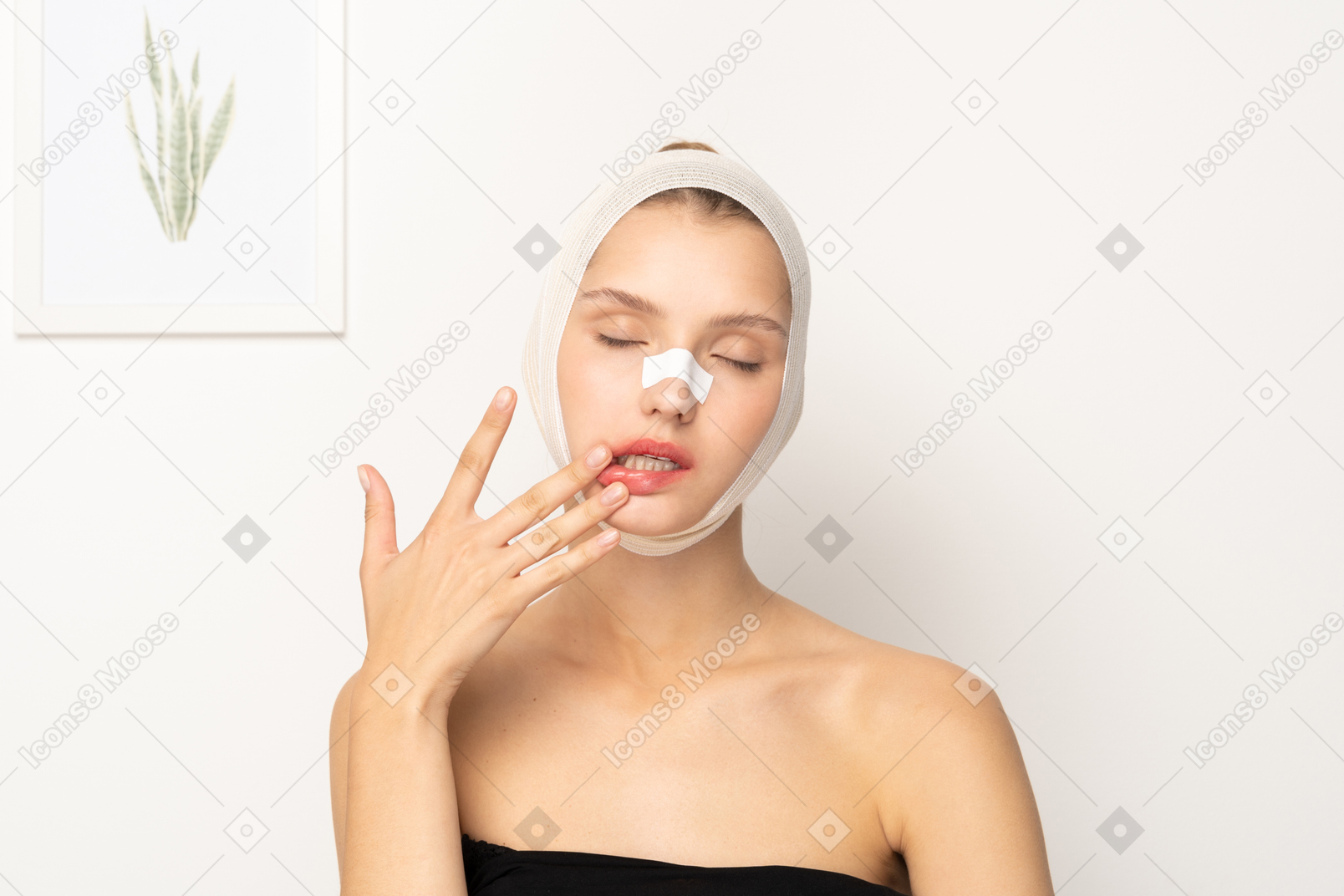 Young woman with bandaged head touching her lips