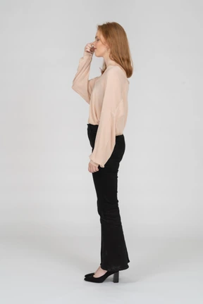 Woman in beautiful blouse standing