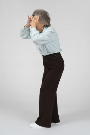 Old lady looking like in binocular