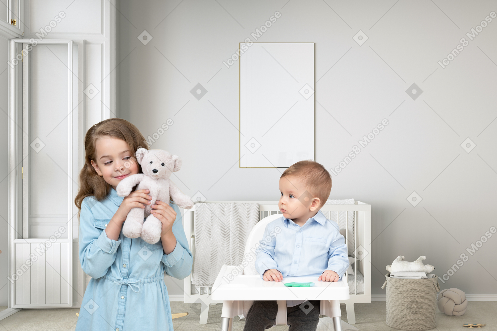 Baby boy looking at his elder sister