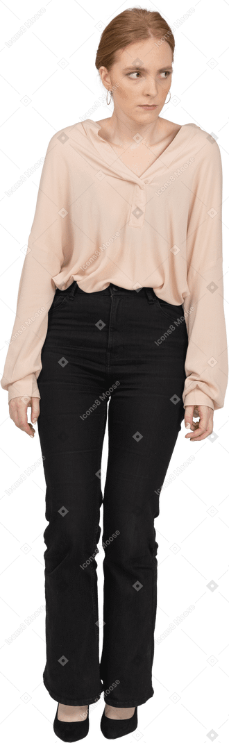 Woman in beautiful blouse standing