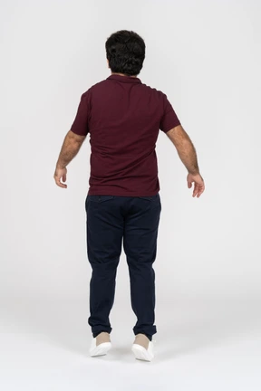 Back view of a man in casual clothes