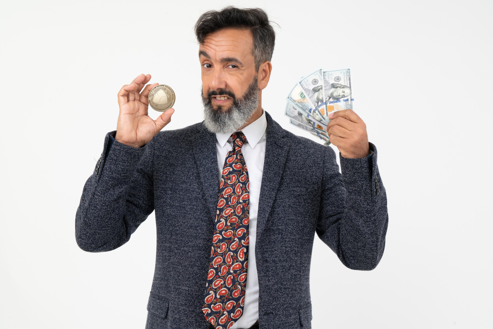 Mature man holding a nem coin and dollar bills