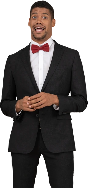 Man in black suit standing