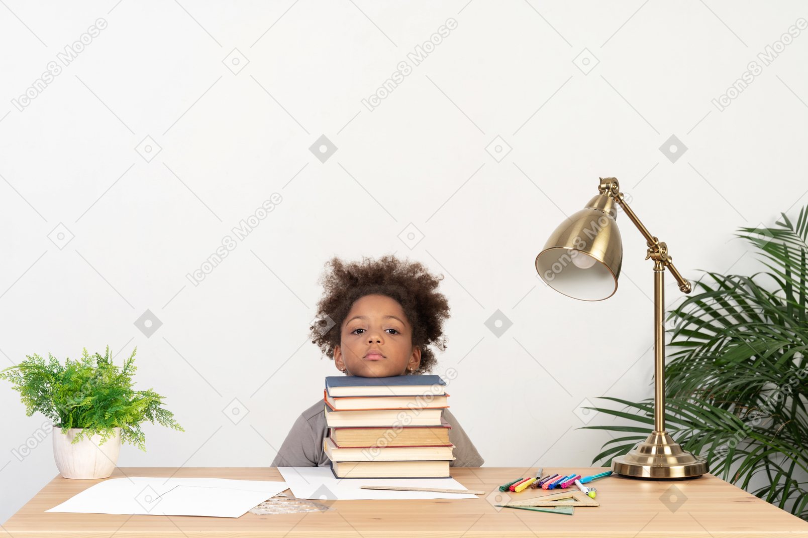 Good looking cute girl with books at the table