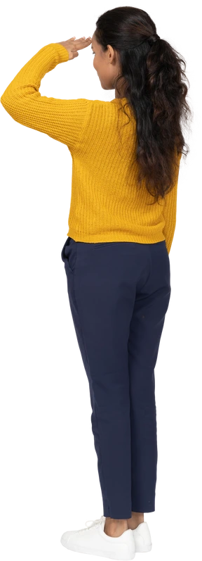 Rear view of a girl in casual clothes saluting with hand