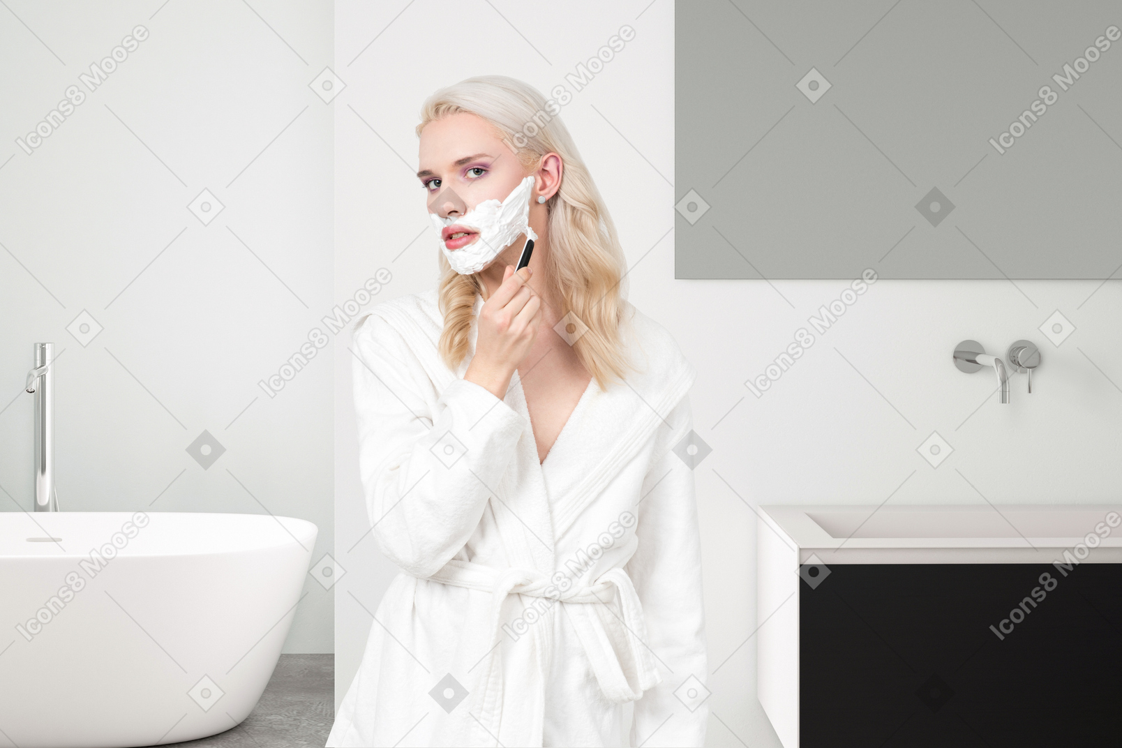 A person shaving their face in a bathroom