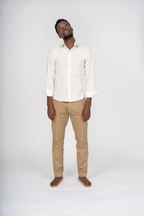 Man in white shirt standing