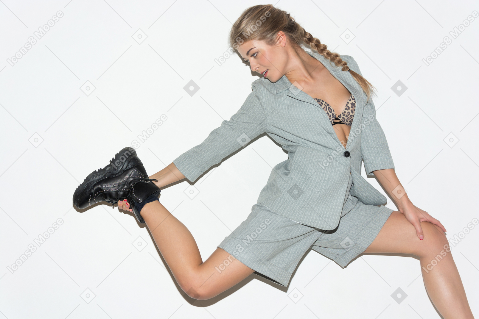 A young woman stretching her legs