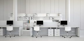 Office space with computer equipment and stationery