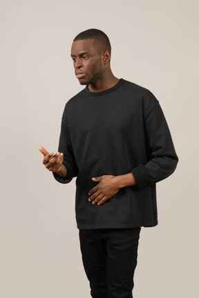 Young man talking and gesturing