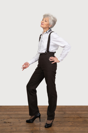 Businesswoman standing with hand on hip