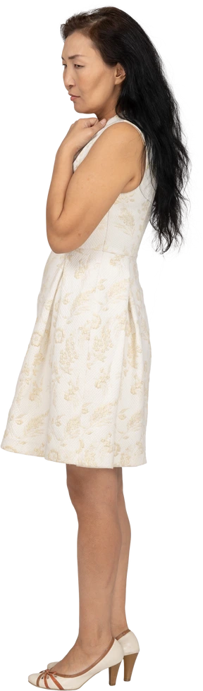 Woman in beautiful dress standing