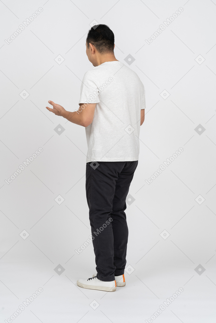Side view of a man explaining something