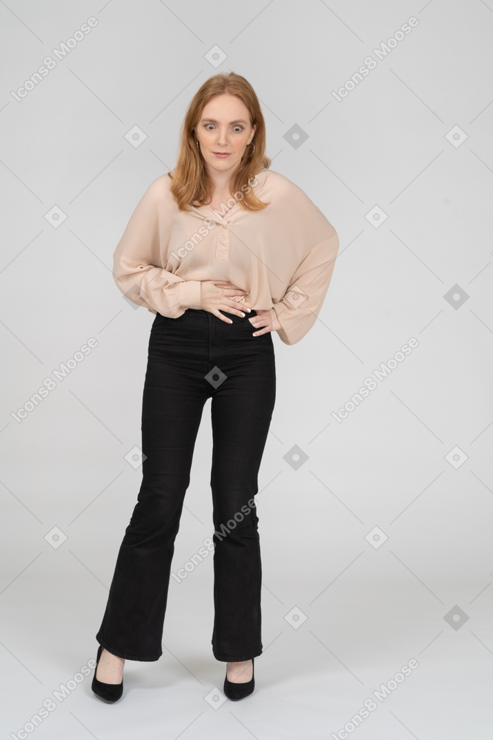 Woman in beautiful blouse standing